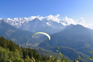 Paragliding over Chamonix valley Mont Blanc