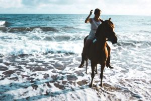 Horse riding along the beach